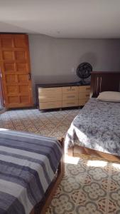 Un pat sau paturi într-o cameră la Chácara Águas São Pedro