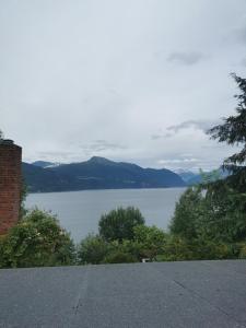 a view of a body of water from a house at Stranda apartment in Stranda