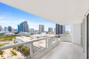 a balcony with a view of the city at Ocean Utopia in Miami