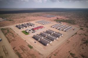 an aerial view of a group of parking lot at Ellipse Global Lodge in Carlsbad