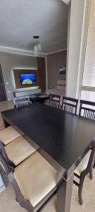 TV a/nebo společenská místnost v ubytování Luis Penthouse