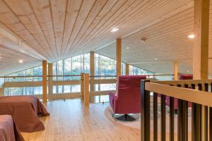 Posezení v ubytování Mustikkakallio Luxury Villa