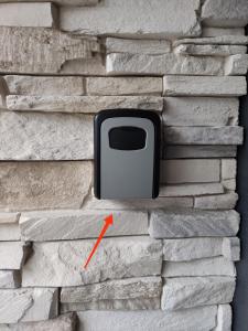 a wall with a tv embedded in a brick wall at Apartments Relax in Dunajská Streda