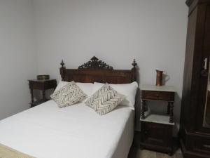 Llit o llits en una habitació de CASA EGIPCIA Preciosa casa centenaria en el Camino de Santiago