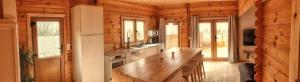 Kuchyňa alebo kuchynka v ubytovaní Vue imprenable et jacuzzi 4 Etoiles + 15 fotografií