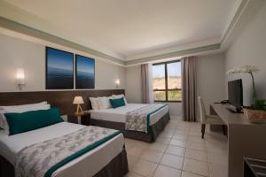 Cama ou camas em um quarto em Wish Natal