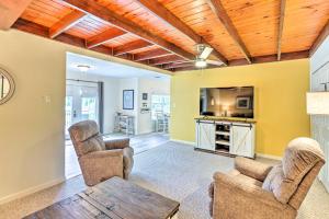 a living room with chairs and a table at Waterfront Home Spectacular On-Site Fishing! in Panacea