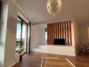 TV a/nebo společenská místnost v ubytování Apartment Bella