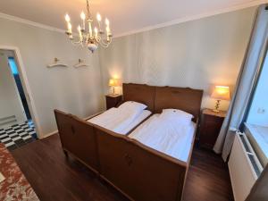 Ein Bett oder Betten in einem Zimmer der Unterkunft Überfahrt vor Sylt