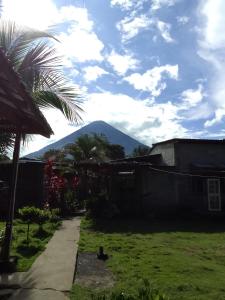 a view of a mountain from a house at Hostal Bullshark in Cuatro Esquinas