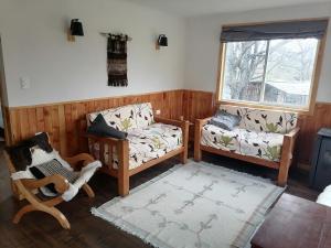 Χώρος καθιστικού στο Cabaña Turismo EL SUSURRO