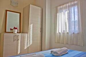 Postel nebo postele na pokoji v ubytování Green Park Apartments