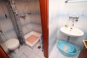 Kúpeľňa v ubytovaní Apartment Vrboska 8748a