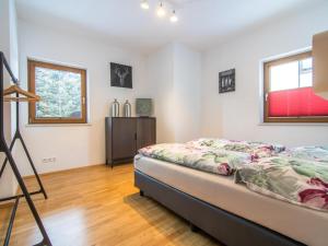 Ein Bett oder Betten in einem Zimmer der Unterkunft Haus Bergblick