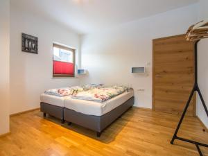 Ein Bett oder Betten in einem Zimmer der Unterkunft Haus Bergblick