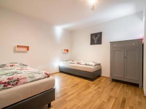 Ein Bett oder Betten in einem Zimmer der Unterkunft Haus Bergblick