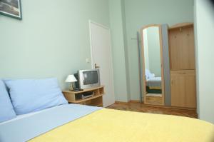 Postel nebo postele na pokoji v ubytování Studio Vodice 4172c