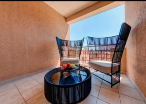 two chairs and a coffee table in a room at Villa Pedja Zec in Budva