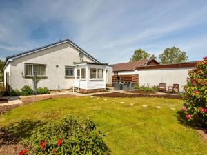 a house with a garden in front of it at Westburn in Comrie