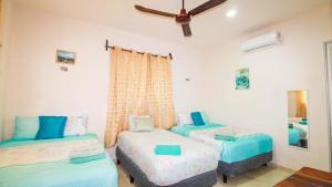 Ένα ή περισσότερα κρεβάτια σε δωμάτιο στο Siyan Ka'an Bak'halal +28 φωτογραφίες