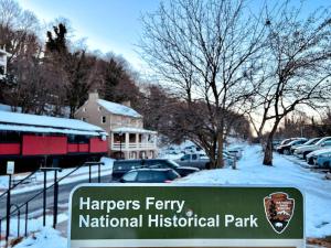 a sign for harpers ferry national historical park in the snow at 1799 Inn Harpers Ferry in Harpers Ferry +5 photos