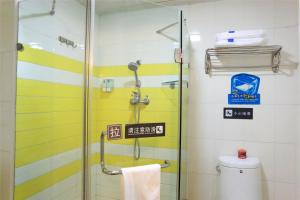 a bathroom with a shower and a toilet at 7Days Inn Nanchang Ding Gong Road in Nanchang