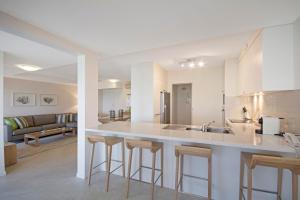 A kitchen or kitchenette at Costa Nova Holiday Apartments