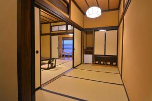 an open door to a room with a view at Nikko Tokinoyuu in Nikko