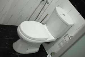 Koupelna v ubytování Hotel Agape