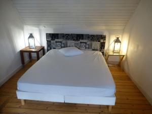 Posteľ alebo postele v izbe v ubytovaní Holiday Home in Terenez by the Lively Port
