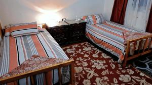 Ein Bett oder Betten in einem Zimmer der Unterkunft Star House City Stars