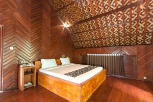 Letto o letti in una camera di Bali Jungle Resort