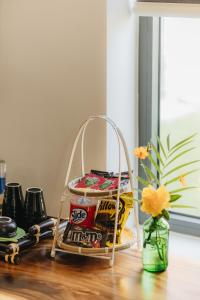 a basket of chips and snacks on a table at Ngoc An Bang Villa in An Bàn (2)