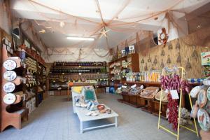 a store filled with lots of different types of goods at Hotel Santa Lucia in Parghelia