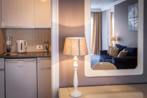 Kuchyň nebo kuchyňský kout v ubytování First Euroflat Hotel