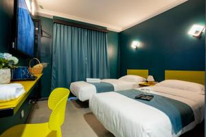 Postel nebo postele na pokoji v ubytování Hotel 28 Chow Kit Kuala Lumpur