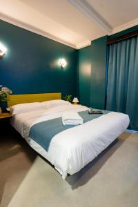 Postel nebo postele na pokoji v ubytování Hotel 28 Chow Kit Kuala Lumpur