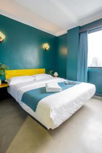 Postel nebo postele na pokoji v ubytování Hotel 28 Chow Kit Kuala Lumpur
