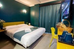 Postel nebo postele na pokoji v ubytování Hotel 28 Chow Kit Kuala Lumpur