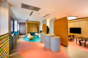 TV a/nebo společenská místnost v ubytování M Resort & Hotel Kuala Lumpur