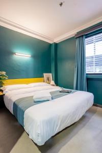 Postel nebo postele na pokoji v ubytování Hotel 28 Chow Kit Kuala Lumpur
