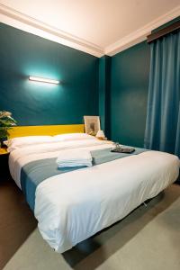 Postel nebo postele na pokoji v ubytování Hotel 28 Chow Kit Kuala Lumpur