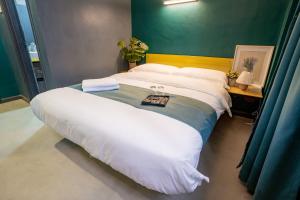 Postel nebo postele na pokoji v ubytování Hotel 28 Chow Kit Kuala Lumpur