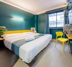 Postel nebo postele na pokoji v ubytování Hotel 28 Chow Kit Kuala Lumpur
