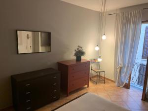 Televízia a/alebo spoločenská miestnosť v ubytovaní Casa Luisini