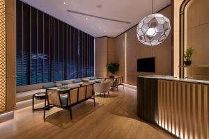 TV a/nebo společenská místnost v ubytování M Resort & Hotel Kuala Lumpur