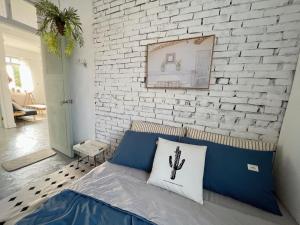 Krevet ili kreveti u jedinici u objektu 山蒔旁白-全台唯一電力公司49年老宿舍改造