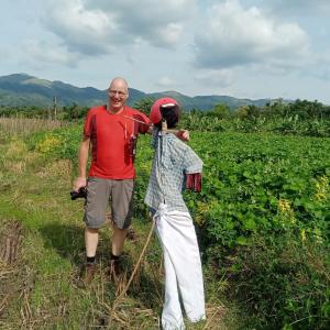 a man and a woman standing in a field at Ridge Boundary View in Dambulla