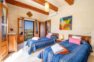 Ένα ή περισσότερα κρεβάτια σε δωμάτιο στο Hamlet 1 Holiday Home