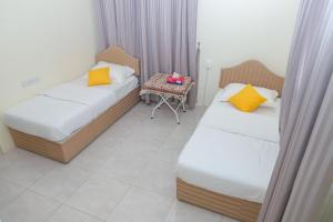 Letto o letti in una camera di Nima guest house